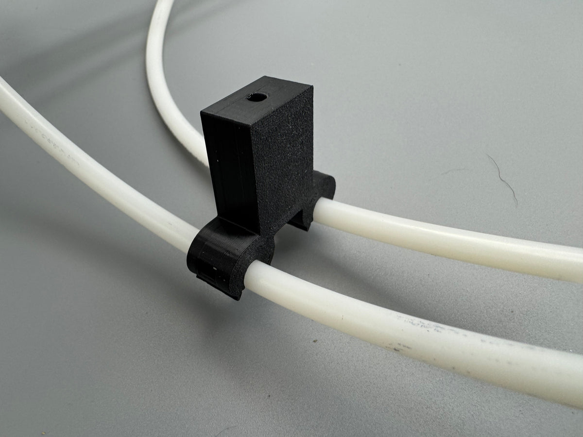 Van's stock dual brake line retainer clip with built-in 25mm standoff